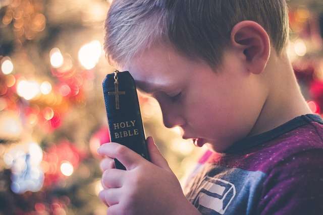 child with Bible